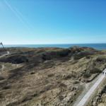 Haus auf Dünen mit Meerblick und Wanderweg