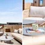 Terrasse mit Sitzgelegenheiten und Tisch. Hintergrund: Holzgeländer und blauer Himmel.