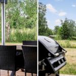 Terrasse mit Tisch und Stühlen. Grill und Grünfläche im Hintergrund.
