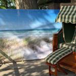 Hochwertige Strandkulisse mit Liegestuhl auf Terrasse