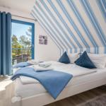 Schlafzimmer mit Doppelbett