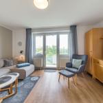 Wohn-Essbereich mit Couch im sihi220, Hus Inselkieker, Mellumweg 6b in Schillig