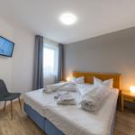Schlafzimmer mit Doppelbett im sihi220, Hus Inselkieker, Mellumweg 6b in Schillig