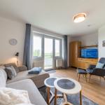 Wohn-Essbereich mit Sitzgelegenheit im sihi220, Hus Inselkieker, Mellumweg 6b in Schillig