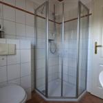 Bathroom with shower, toilet, and bathtub.