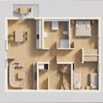 Dieses Apartment hat eine Küche, ein Bad, ein Schlafzimmer und einen Wohnbereich mit Sofa.