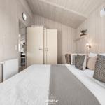 Schlafzimmer mit Bett, Kleiderschrank und Holzwänden.