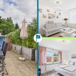 Haus mit Garten, Wohnzimmer und Schlafzimmer mit Fenstern und Möbeln.
