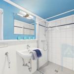 Bathroom with shower, sink, and window. Blue walls and white tiles.