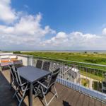 Balkon mit Ausblick im sinf48-6-N, Nordsee-Resort Friesland, Mellumweg 1 in Schillig