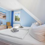 Schlafzimmer mit Doppelbett