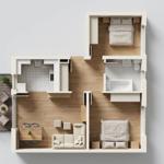 Zweizimmer-Wohnung mit Küche, Bad, Terrasse und Wohnbereich mit Sofa.