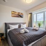 Schlafzimmer 2: Doppelbett (180x200), TV