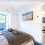 Schlafzimmer 1: Doppelbett (180x200), TV