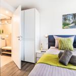 Schlafzimmer 1: Doppelbett (180 x 200), TV