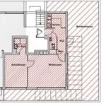 Die Wohnung hat einen Schlaf- und Wohnbereich, eine Küche, ein Bad und eine Dachterrasse.