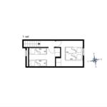 Ground floor plan with bedrooms, living area, and stairs to upper level.