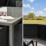 Terrasse mit Gartentisch und Blick auf Grünfläche und Häuser