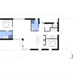 Wohnzimmer mit Sofa, Fernseher und Holzwand