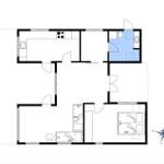 Wohnung mit Küche, Bad, Schlafzimmer und Wohnbereich. Raumhöhen und Möbel sind eingezeichnet.