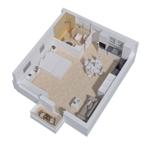 Panoramablick auf Küstenstadt mit Häusern und Meer unter blauem Himmel.
