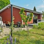 Two bedrooms, kitchen, bathroom, and living area with compass