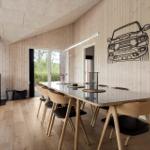 Bathroom with bathtub, toilet, and shower. Wooden walls and airplane decor.